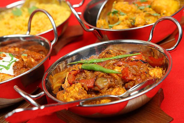 Indian chicken jalfrezi with other dishes