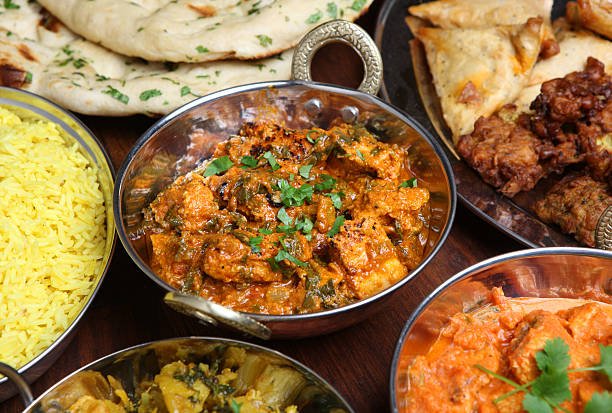 Indian chicken saag massala curry in balti dish